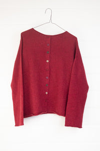 Baby yak one size reversible cardigan sweater with hand embroidered buttons in cherry red.