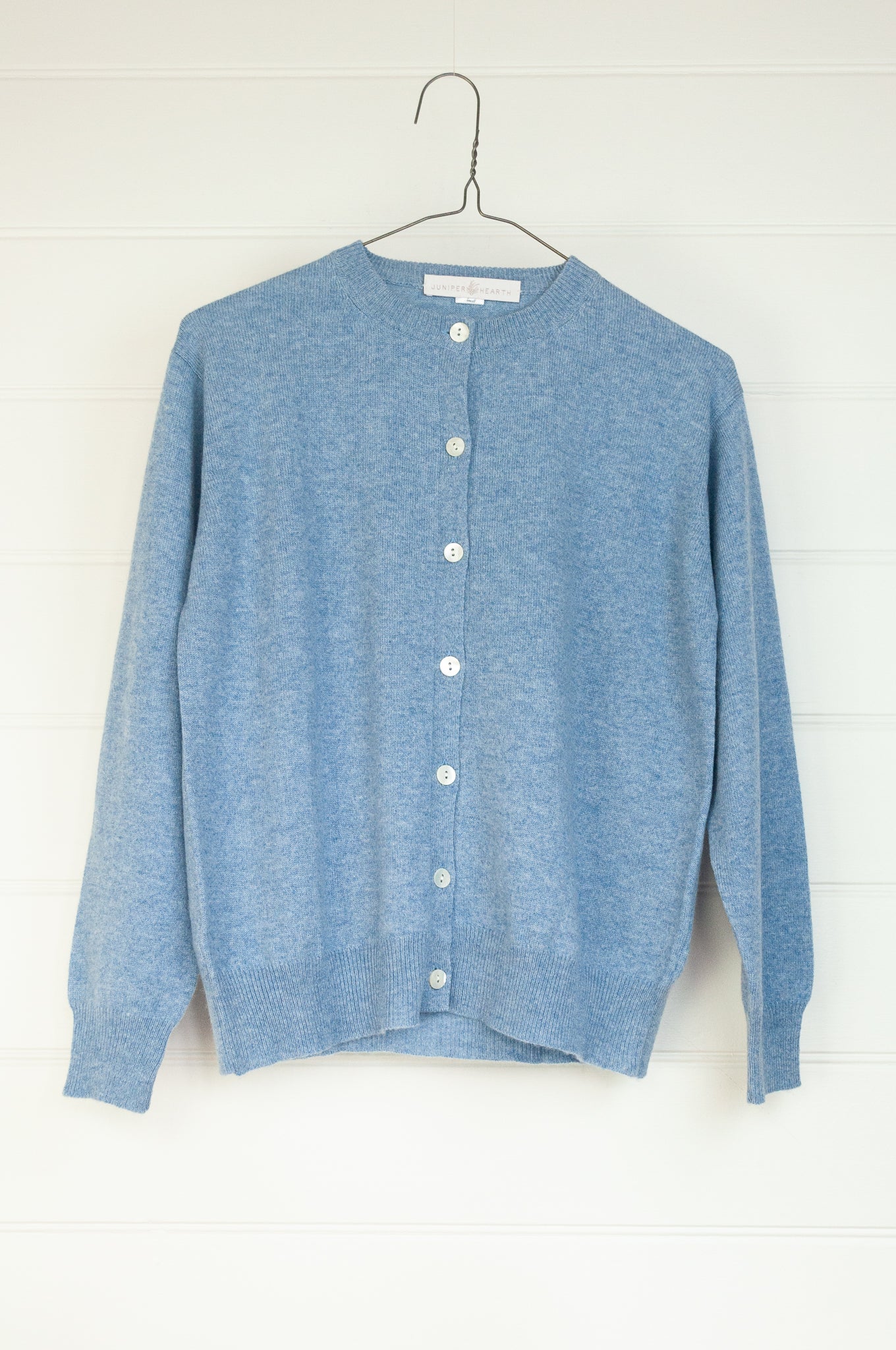 Juniper Hearth 100% cashmere button up crew neck cropped cardigan in sky blue.