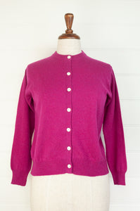 Juniper Hearth 100% cashmere button up crew neck cropped cardigan in magenta pink..
