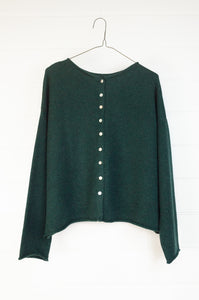 One size reversible cardigan ethically made in Nepal from 100% pure cashmere, in deep bottle green.