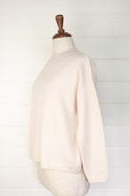 Load image into Gallery viewer, One size crew neck cashmere sweater ethically made in Nepal in blush ecru cream.
