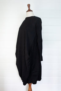 Banana Blue black poly voly tunic with ribbing and panelling and front bagged pockets.