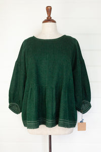 DVE Collection Anisha pintucked one size top in soft boiled wool in forest green.