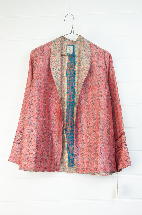 DVE Collection one of a kind reversible silk kantha Neeli jacket - small floral print on vintage pink one side, with a subtle print on on cream, with blue highlight, on the reverse.