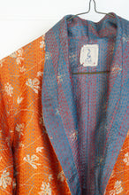 Load image into Gallery viewer, DVE Collection one of a kind reversible silk kantha Neeli jacket has a simple floral print on saffron on one side, and also on the reverse on steel blue.