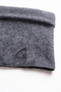 PCNQ grey wool woven beanie with gather at top that releases to create a snood, made in Japan.