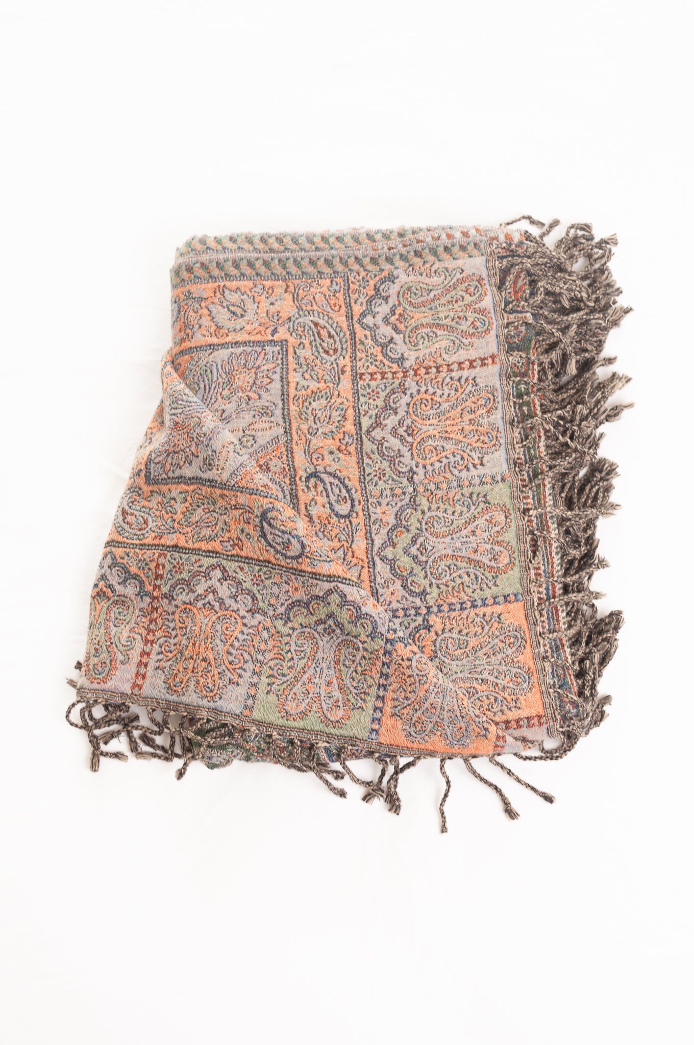 Juniper Hearth denim and rust pure wool jacquard paisley tasseled throw.