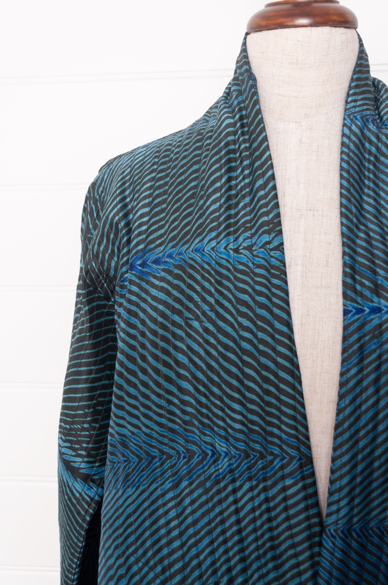 Stunning sapphire and emerald silk shibori coat from Neeru Kumar.