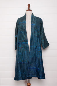 Stunning sapphire and emerald silk shibori coat from Neeru Kumar.