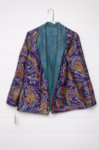 DVE Collection one of a kind reversible silk kantha Neeli jacket has a small floral print on cerulean blue on one side,  and a paisley on the reverse on cobalt blue.