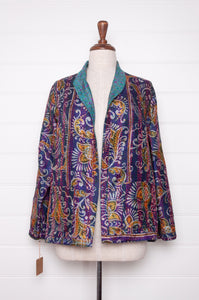 DVE Collection one of a kind reversible silk kantha Neeli jacket has a small floral print on cerulean blue on one side,  and a paisley on the reverse on cobalt blue.