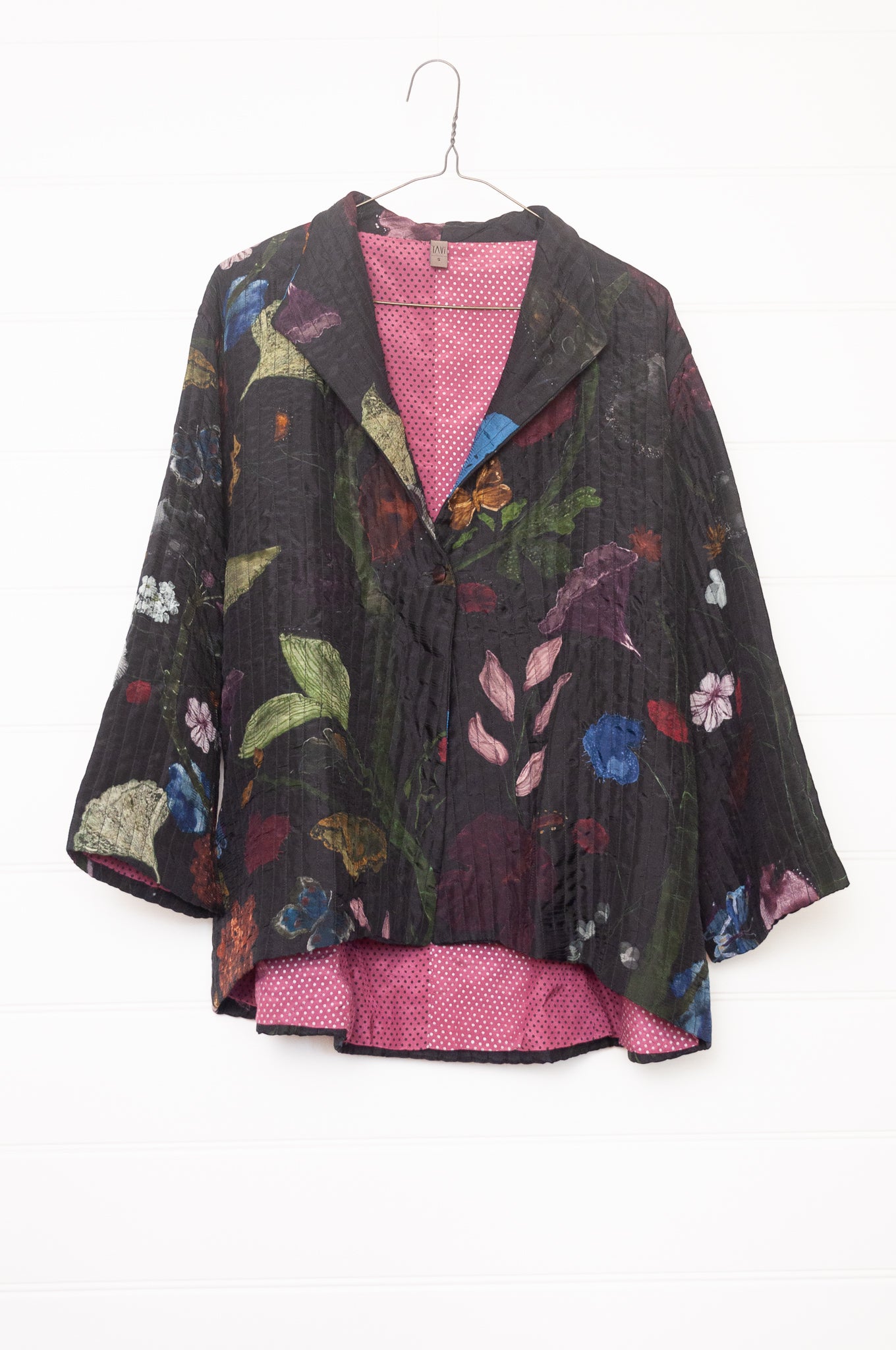Yavi quilted silk jacket in Vine garden print on ink black, pink block print silk lining.