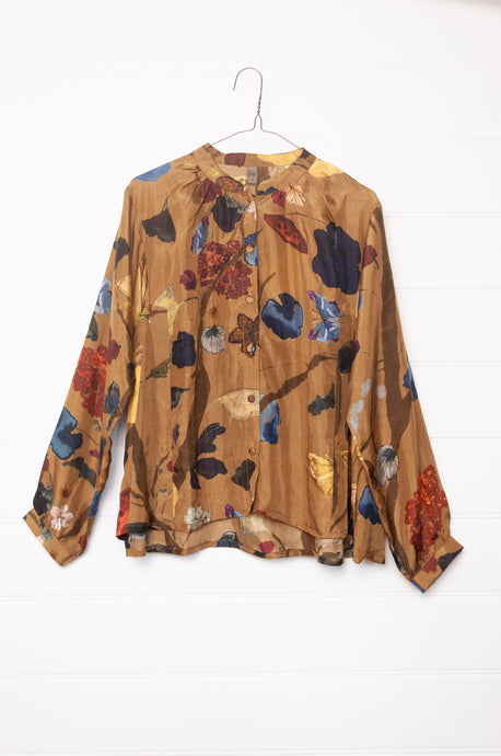 Yavi Tawny silk blouse in Vine garden print on mustard.