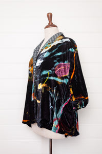 Yavi silk velvet jacket in Unwilted foliage print on ink black, co-ordinating grey printt silk lining.