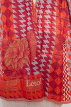 Load image into Gallery viewer, Letol Casimir jacquard weave scarf made in France circus orange and tan houndstooth.