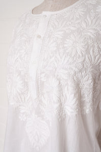 Chikankari white on white embroidered button up long kurta top.