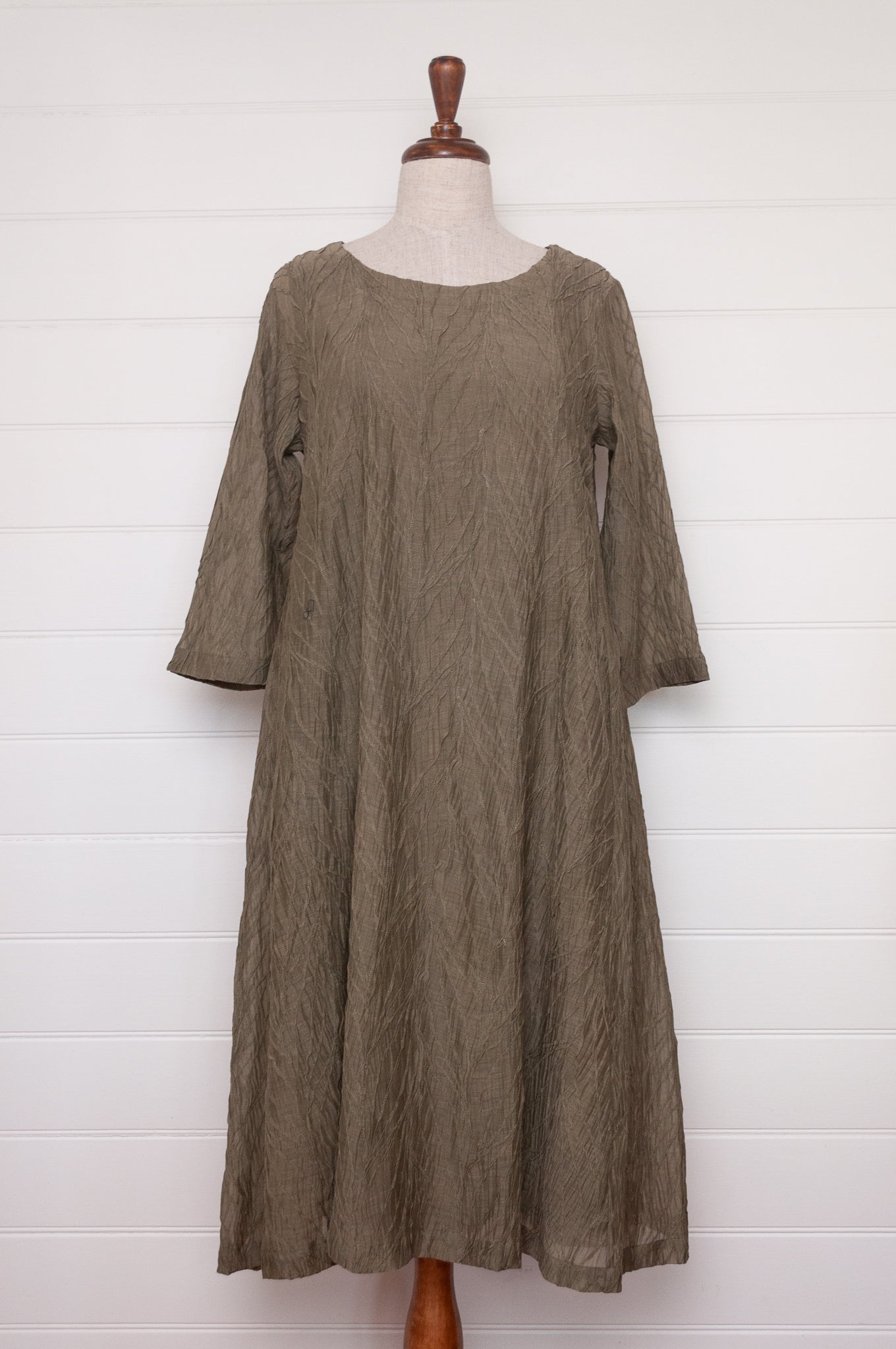 Neeru Kumar silk cotton embroidered dress in olive green.