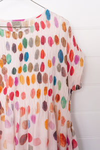 Neeru Kumar fine cotton sun dress with pintucked bodice and cap sleeves. Large multi coloured spots on white.