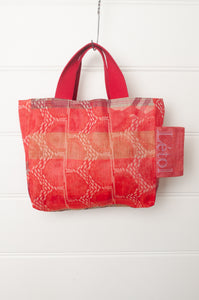 Letol mini tote bag in Perrine rose pink, co-ordinating print on the reverse.