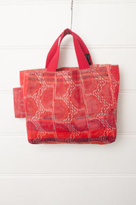 Letol mini tote bag in Perrine rose pink, co-ordinating print on the reverse.