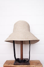 Load image into Gallery viewer, PCNQ made in Japan Leonie foldable paper hat in light grey with black ribbon.