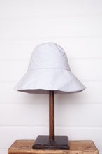 Load image into Gallery viewer, PCNQ made in Japan cotton bucket hat in light grey with generous brim.