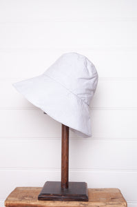 PCNQ made in Japan cotton bucket hat in light grey with generous brim.