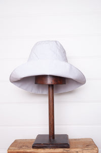 PCNQ made in Japan cotton bucket hat in light grey with generous brim.