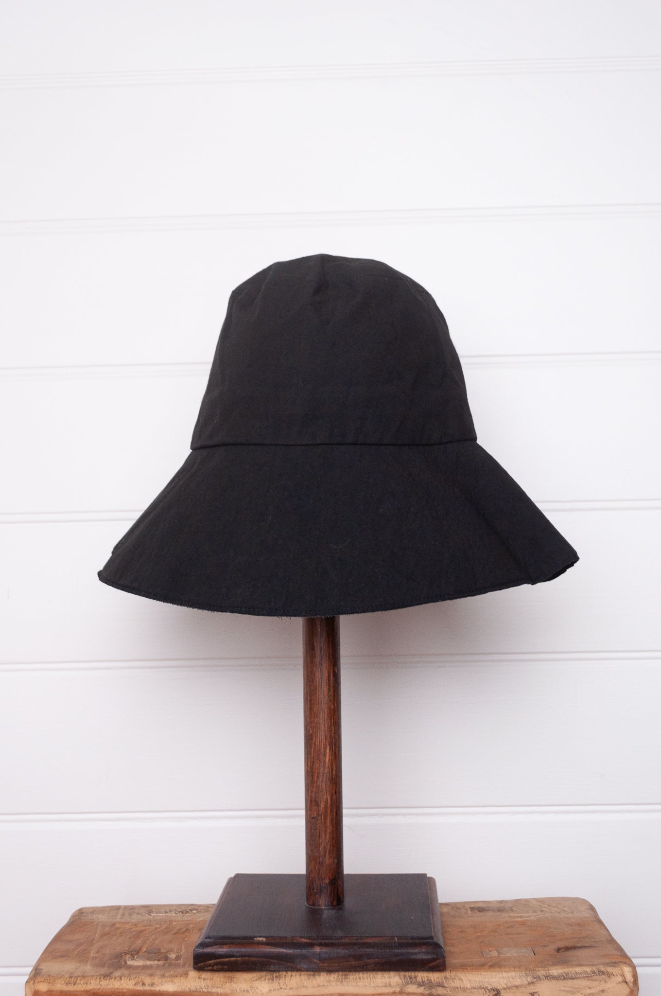 PCNQ made in Japan cotton bucket hat in black with generous brim.