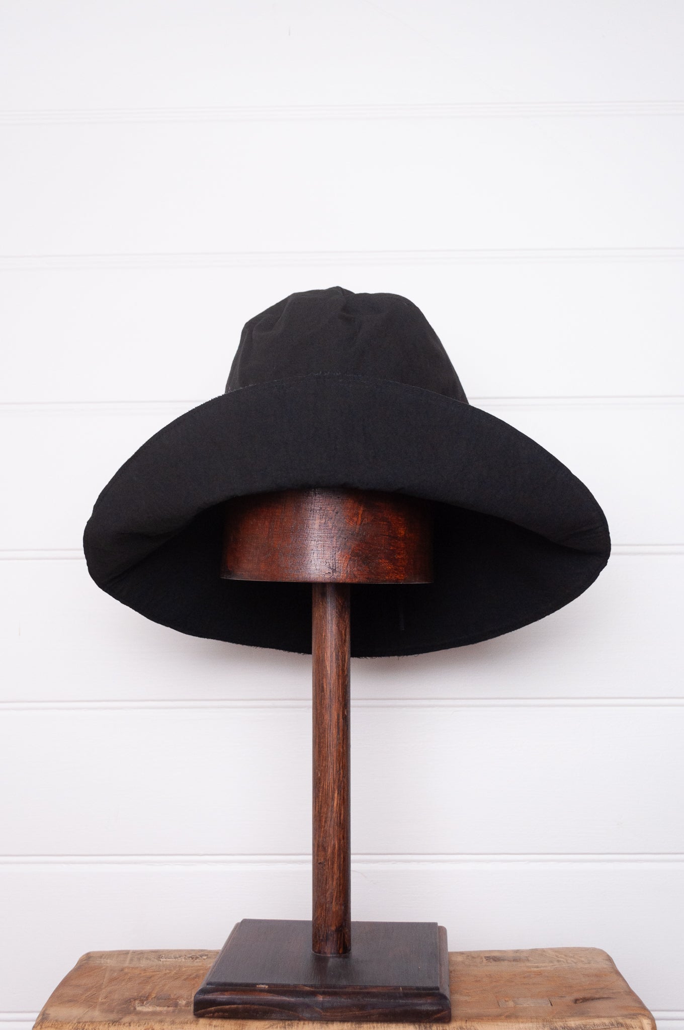 PCNQ made in Japan cotton bucket hat in black with generous brim.