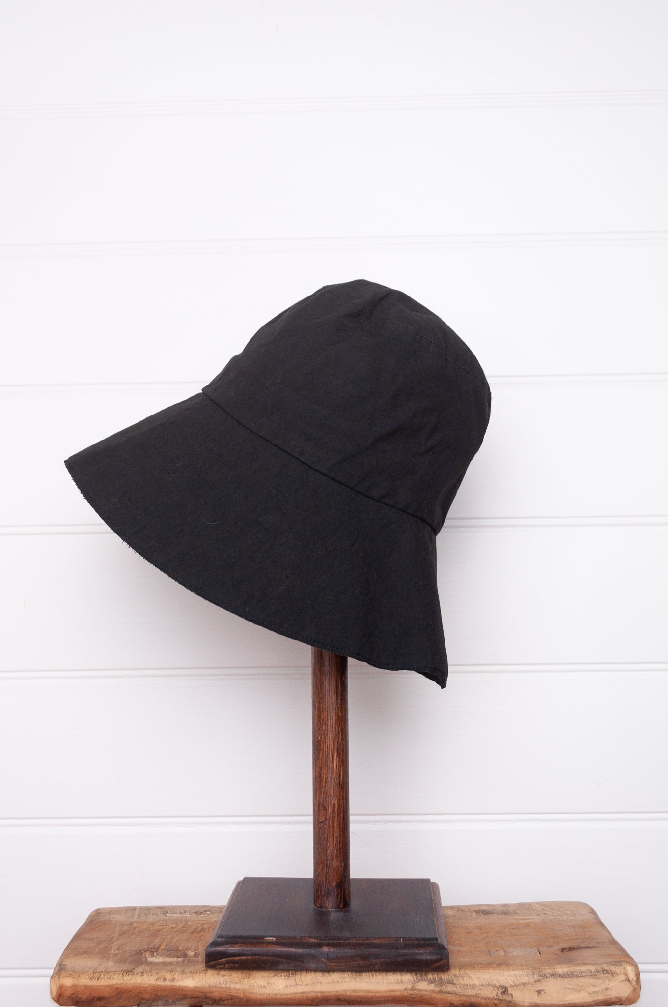 PCNQ made in Japan cotton bucket hat in black with generous brim.