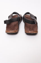 Load image into Gallery viewer, Bosasbo handmade in France cross over slides with molded cork footbed and black calf leather upper with strap and bronze buckle.