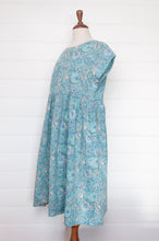 Load image into Gallery viewer, Juniper Hearth blockprint cotton dress with gathered skirt and pockets, in celadon aqua and blue floral.