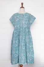 Load image into Gallery viewer, Juniper Hearth blockprint cotton dress with gathered skirt and pockets, in celadon aqua and blue floral.