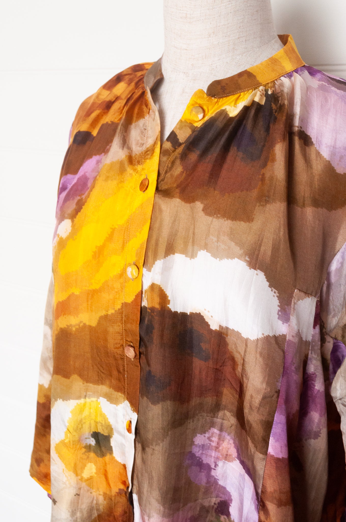 Yavi silk top button up, gathered to neck band, mustard and lilac print.