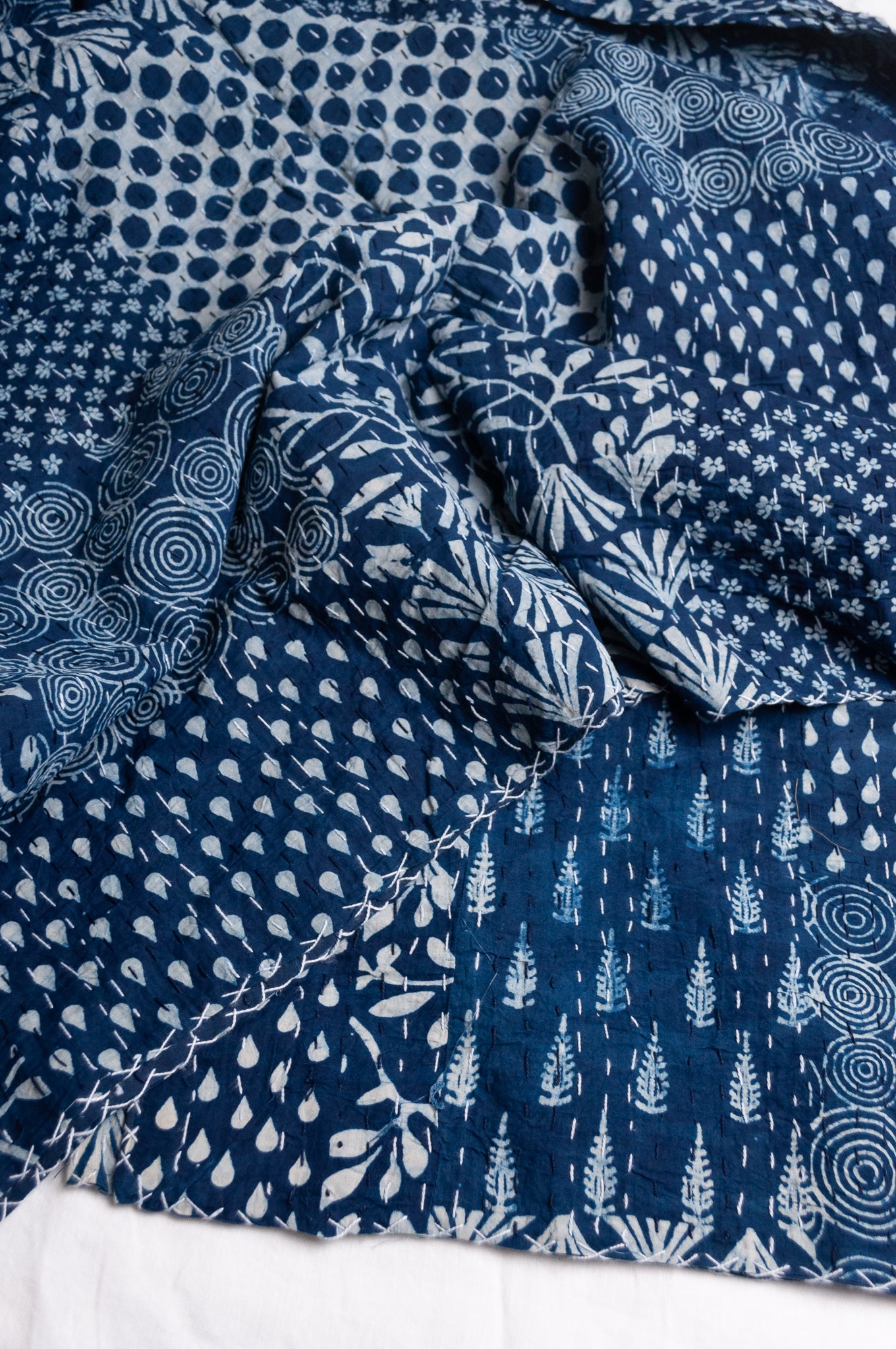Indigo blockprint patchwork handstitched cotton kantha quilt.