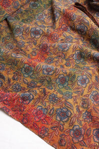 Bagru overdye blockprint vintage kantha quilt in rust red and denim blue on mustard and olive.