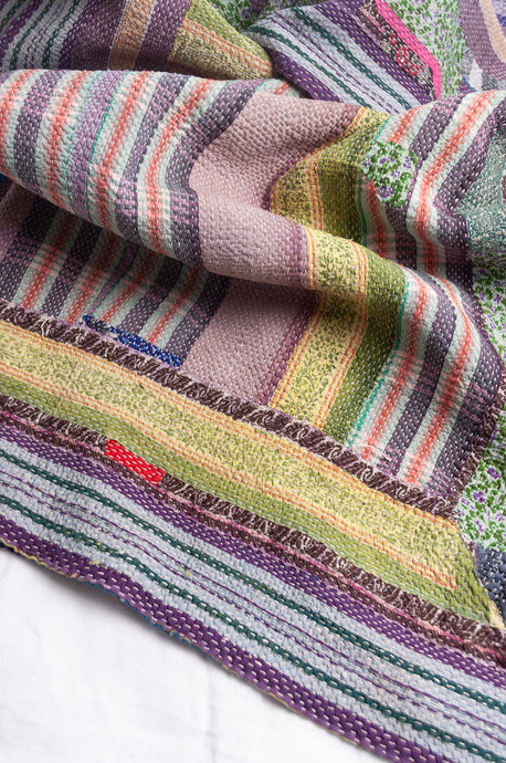 Multi colour striped vintage kantha quilt.