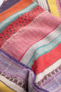 Vintage patch and stripe kantha quilt.