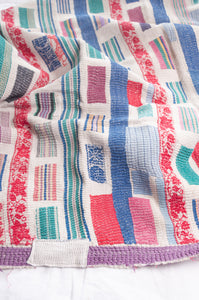 Multi colour patched white vintage kantha quilt.