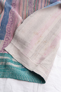 Vintage pastel stripe kantha quilt.