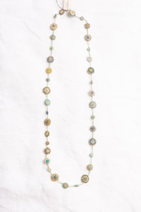 Sophie Digard crocheted linen necklace small pastilles in greens and blues.