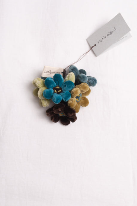 Sophie Digard velvet jonquille brooch in blues and greens.