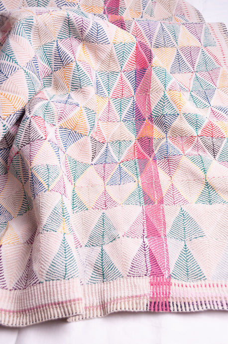 Vintage lohori borfi ('diamond') pattern vintage quilt with multicoloured stitching.