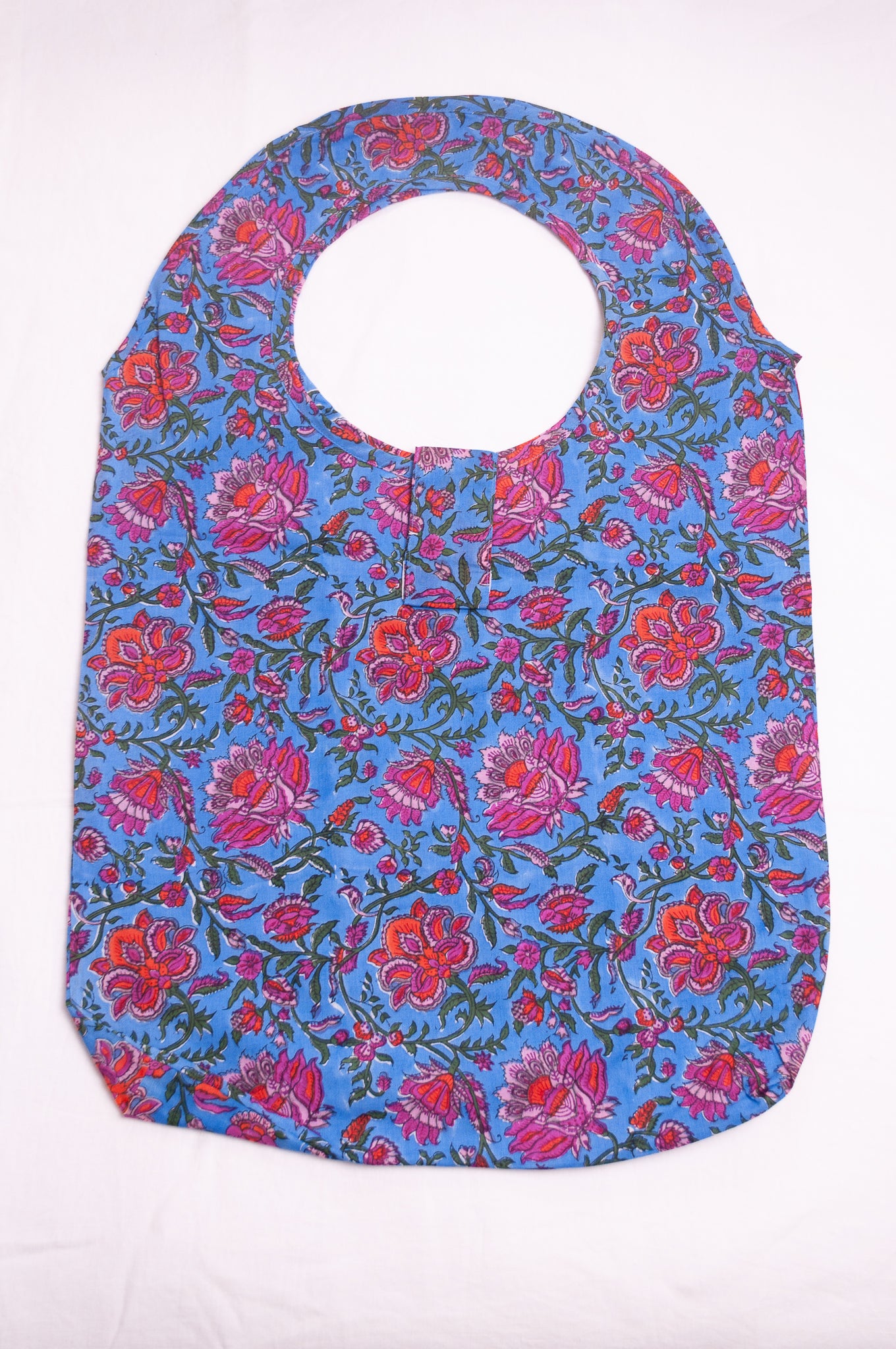 Fabric shopping tote, rollable, in blockprint floral cotton.