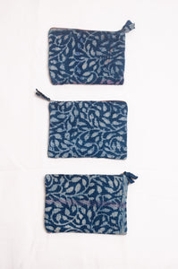 Vintage kantha quilt zippered pouch in overdyed indigo blockprint.