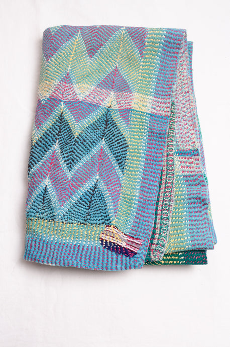 VIntage lohori kantha quilt on aqua base with multi coloured stitching.