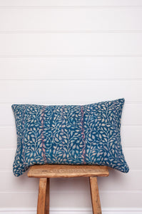 Vintage indigo kantha cushion overdyed with floral print.