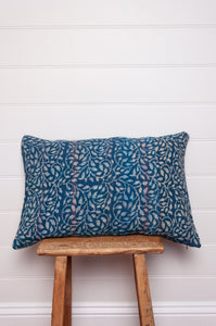 Vintage indigo kantha cushion overdyed with floral print.