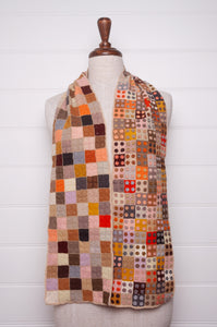 Sophie Digard crochet wool scarf tiny squares with spots in warm earthy tones.